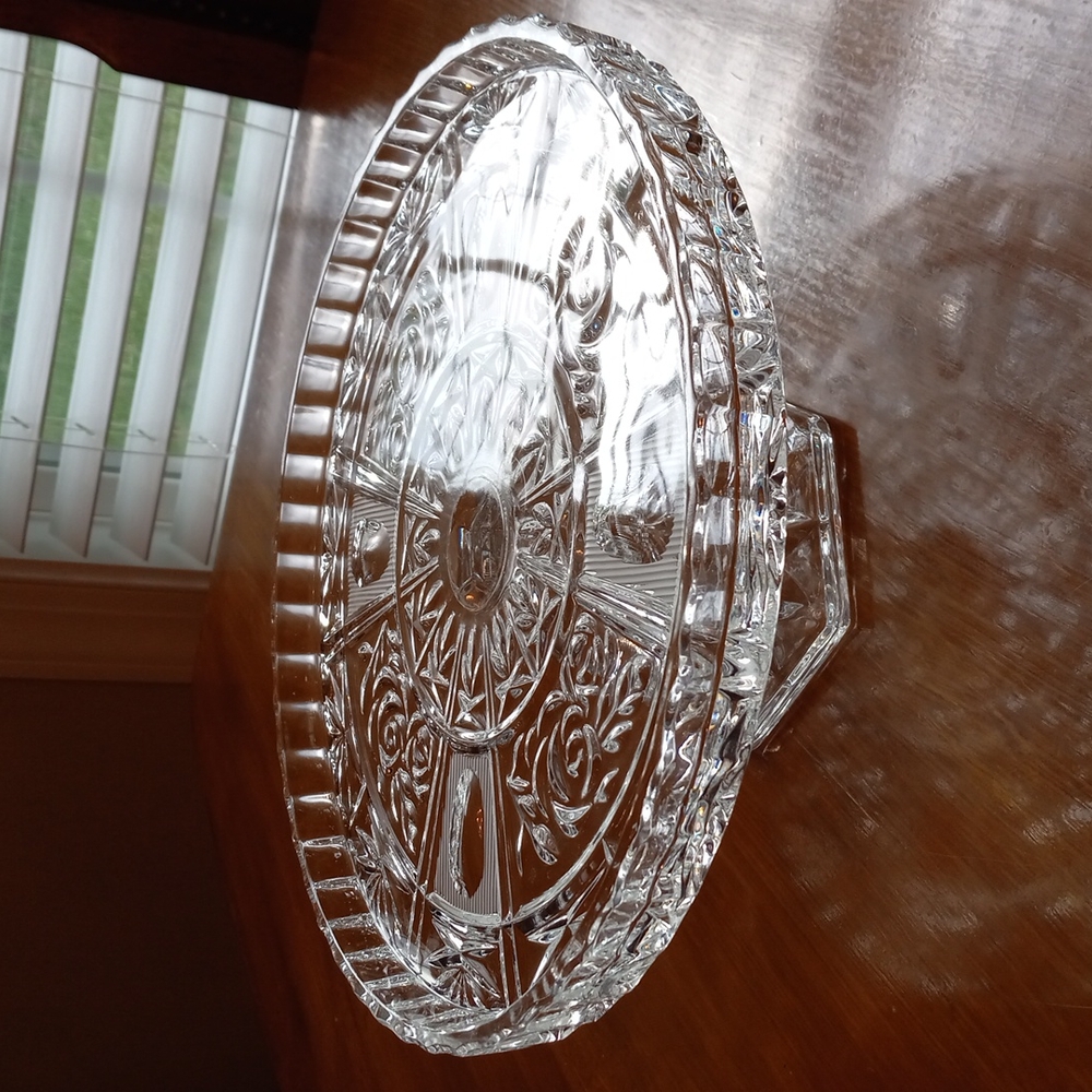 It's a lead crystal cake plate with a stand attached